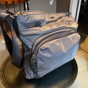 Tumi crossbody silver